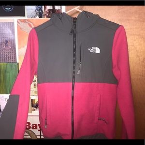 Hot pink North Face zip up jacket.